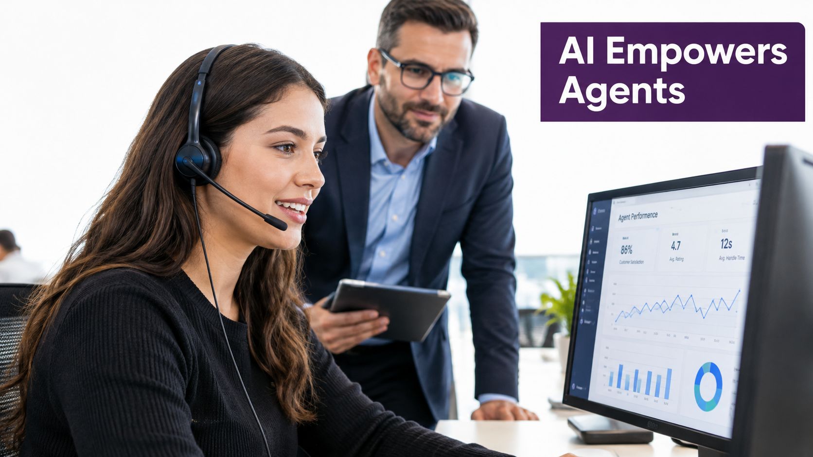 What Is Contact Center Technology: A 2026 Guide 3 A manager assists a customer service agent working at a computer with performance data displayed on screen.